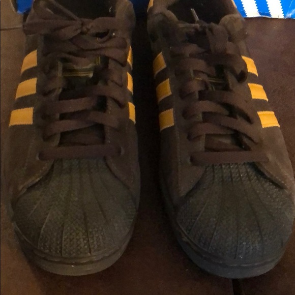 brown adidas shell toes